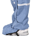 Pantalon de pluie Hello Rain Storm 20K Pearl Blue, vue de profil avec couvre-chaussure