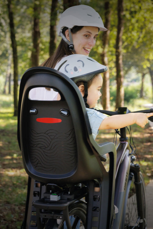 Siège vélo enfant Polisport Groovy MIK-HD porté à vélo, enfant à bord